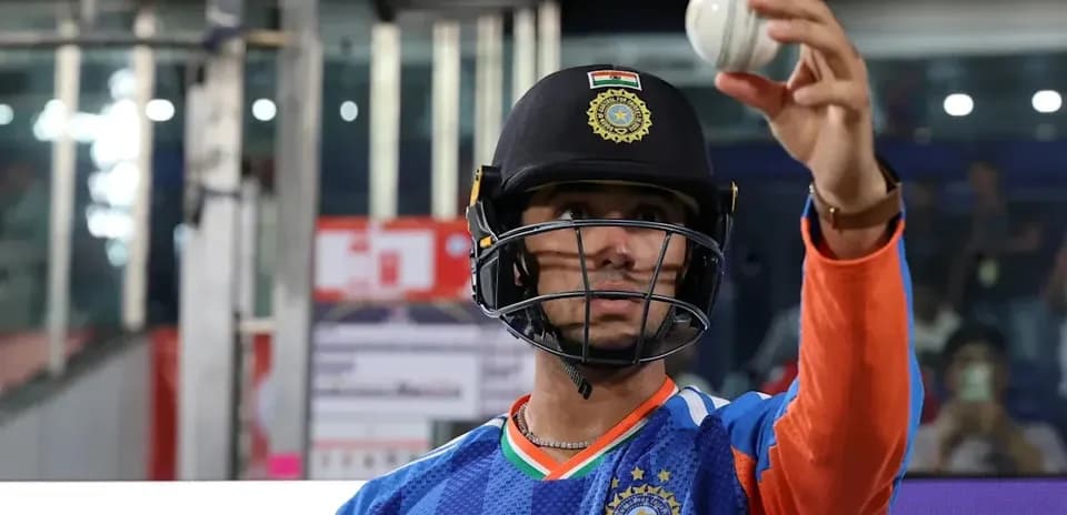 Cricketer holding a ball before the match