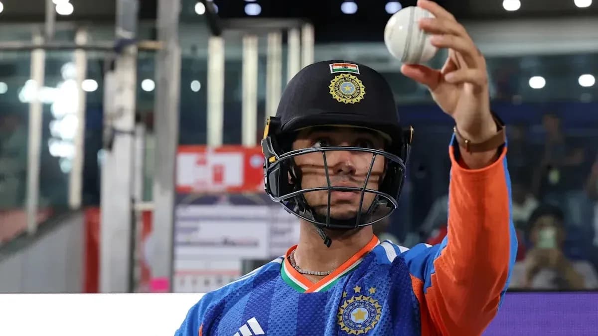 Cricketer holding a ball before the match