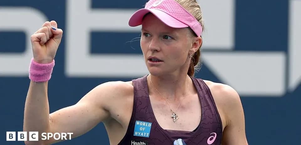 Tennis player celebrating with raised fist during match