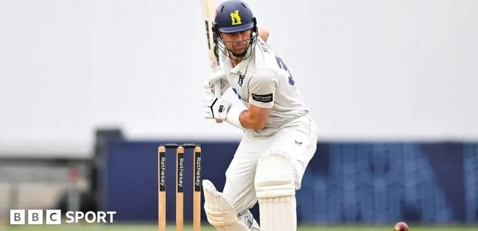 Batter preparing to strike a cricket ball