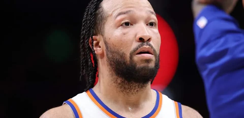 Basketball player in team jersey during game