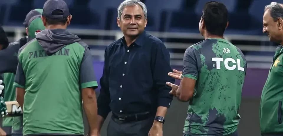 Cricket team discussing strategies during practice session
