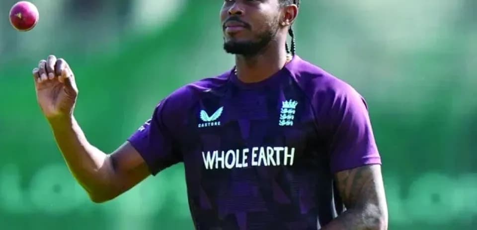 Cricketer holding a ball during practice session