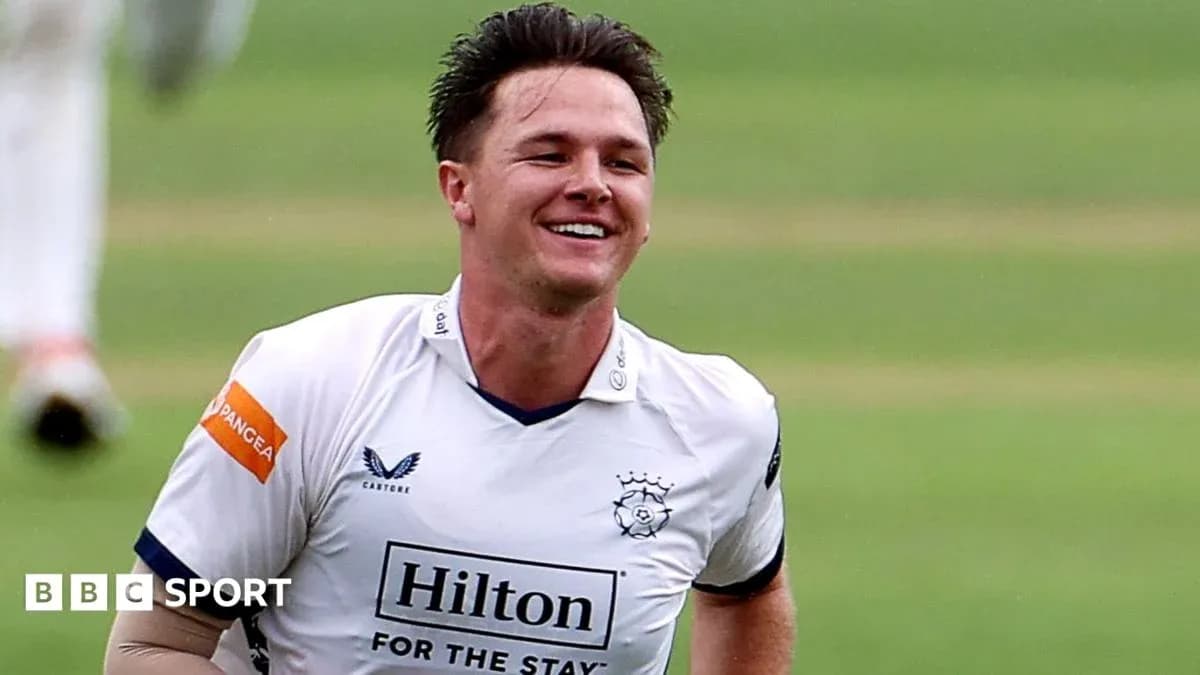 Cricketer celebrating a wicket during a match