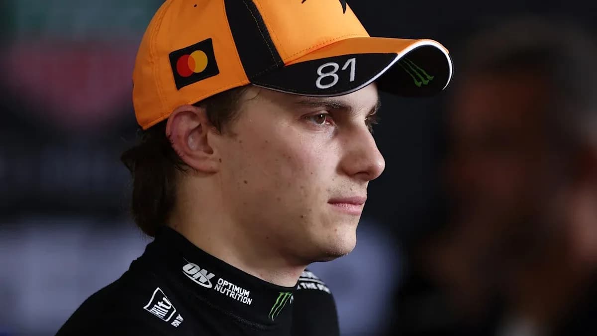Driver wearing a cap during a press event