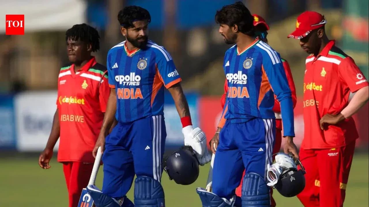 Indian cricketers walking off the field after innings