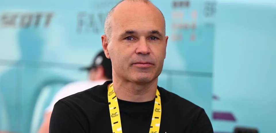 Man with a lanyard at a cycling event