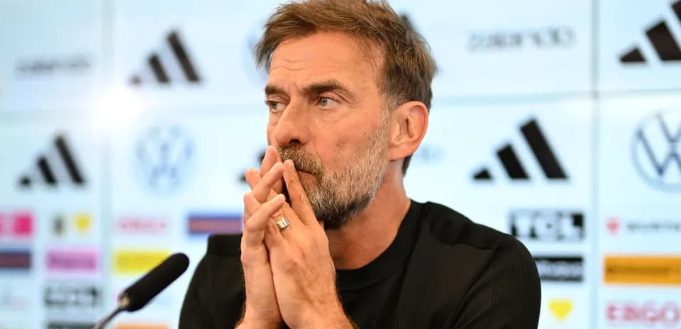 Manager speaking during a press conference with sponsors