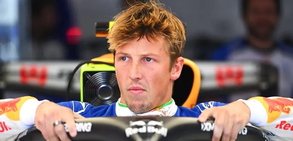 Driver focused inside Formula 1 car cockpit