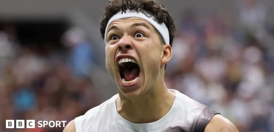 Tennis player celebrating energetically during match