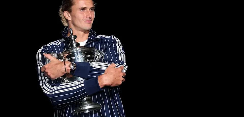 Player holding trophy at awards ceremony