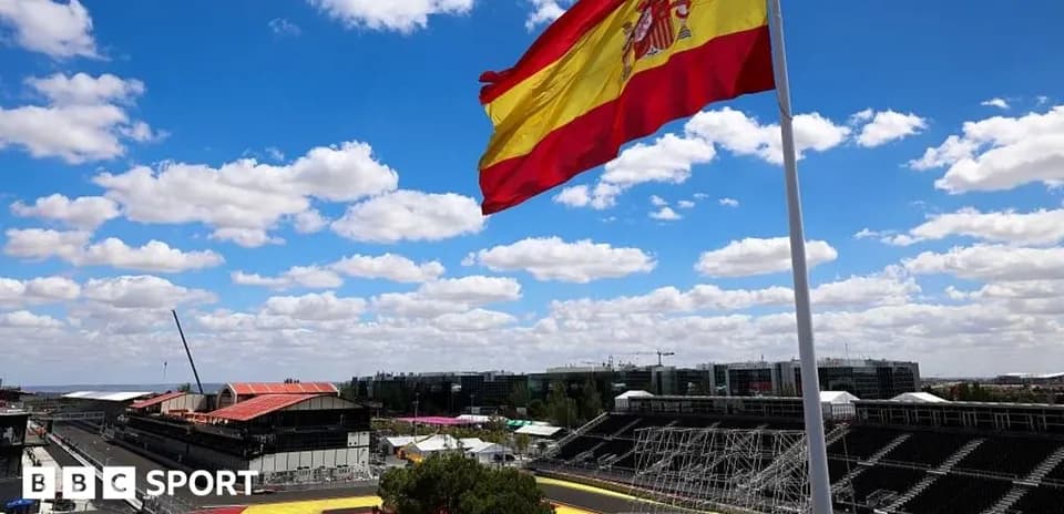 Spanish flag waving at a racetrack venue