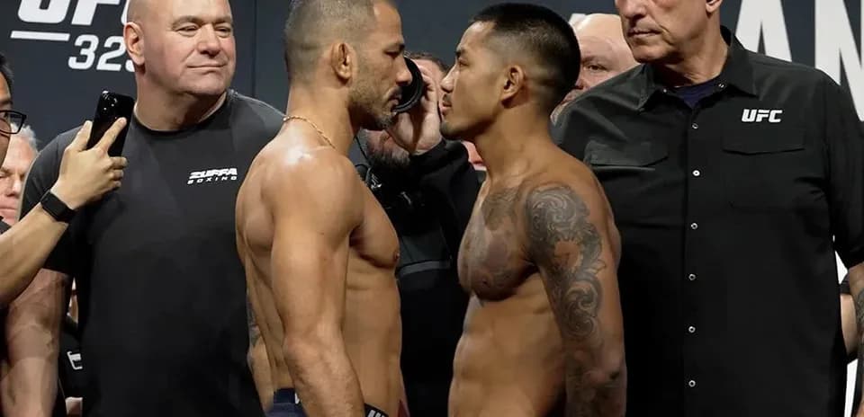 Fighters facing off during UFC weigh-in event