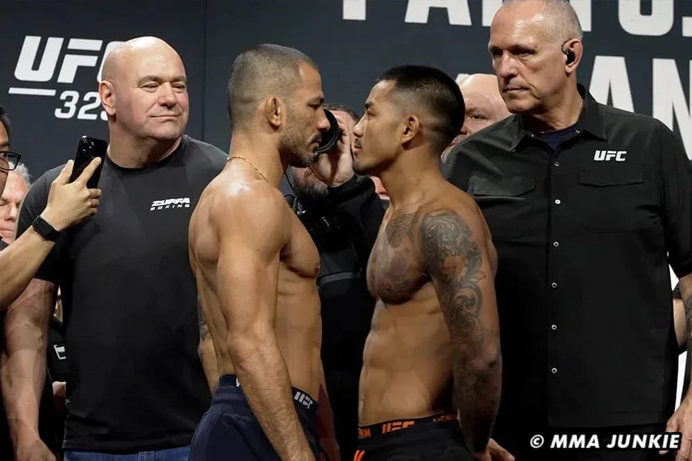 Fighters facing off during UFC weigh-in event