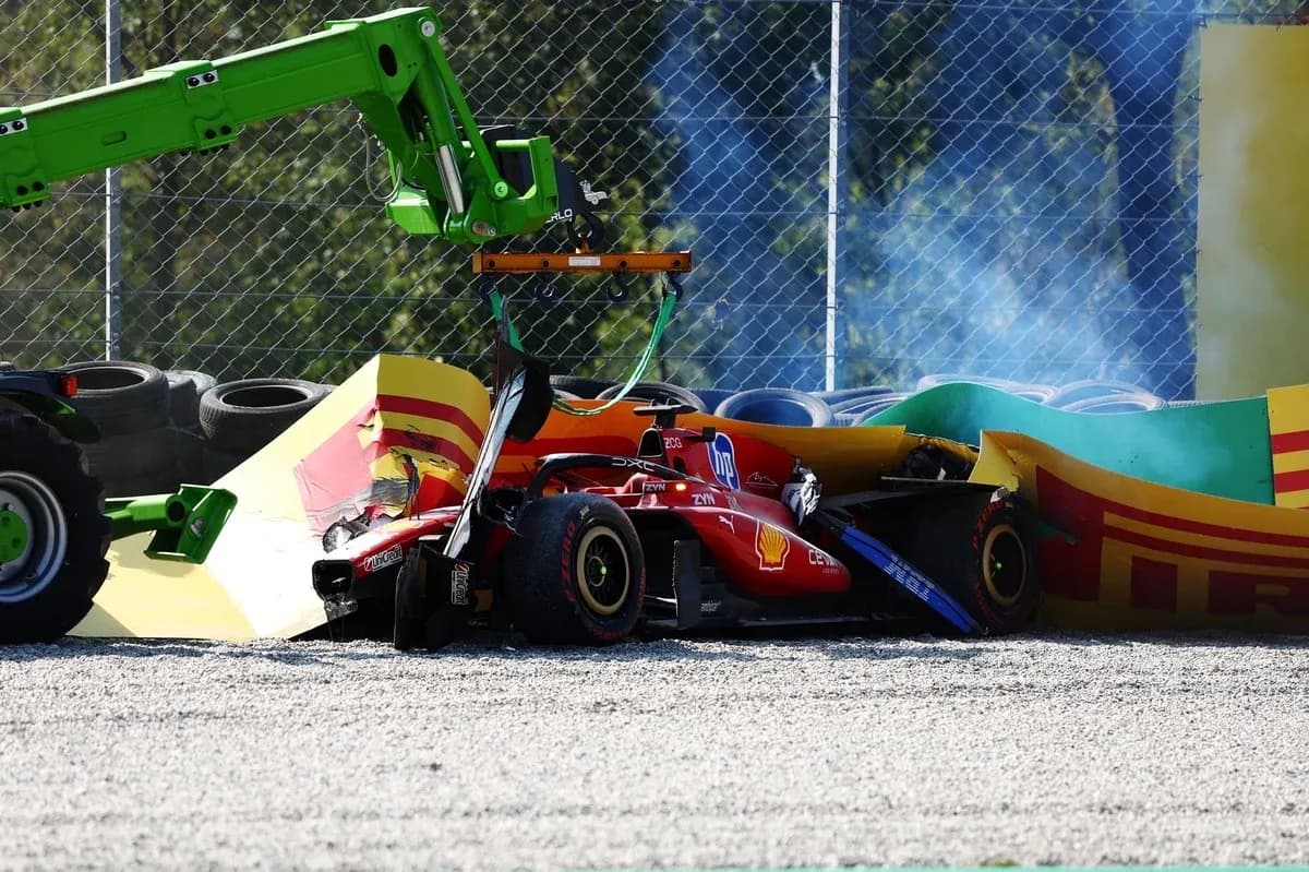 Crashed Ferrari car being lifted by recovery vehicle