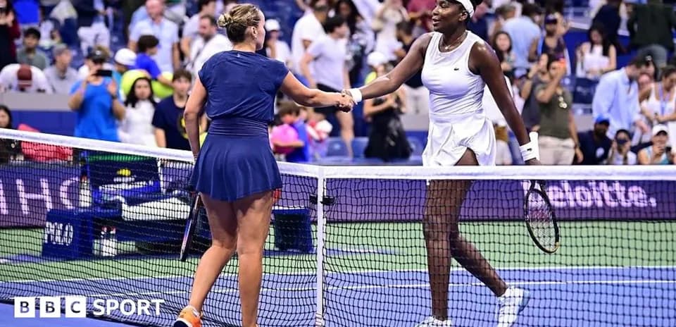 Players shaking hands at the net after match