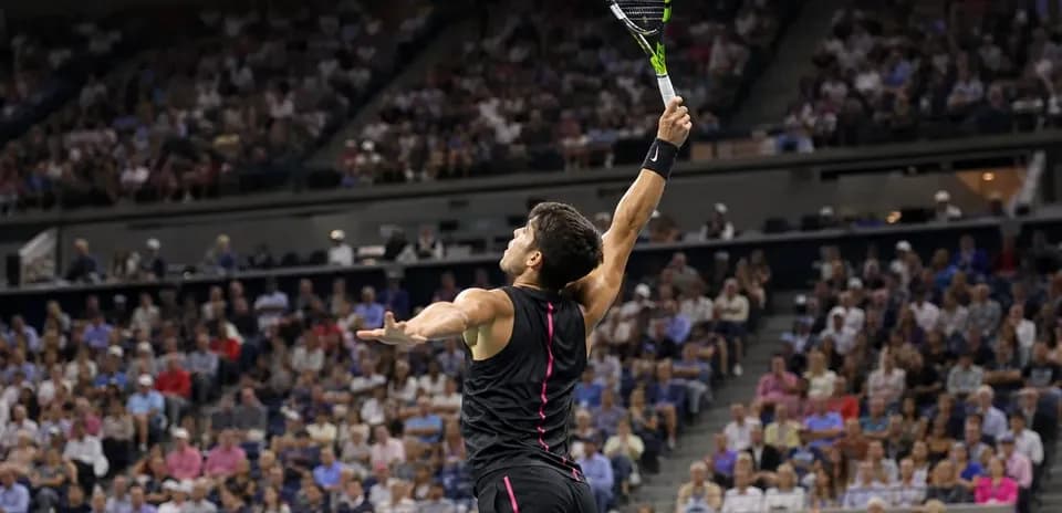 Player serving during a tennis match at stadium