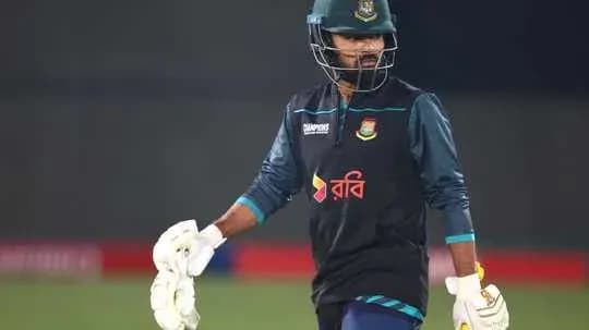 Bangladesh cricketer wearing wicketkeeping gear during training