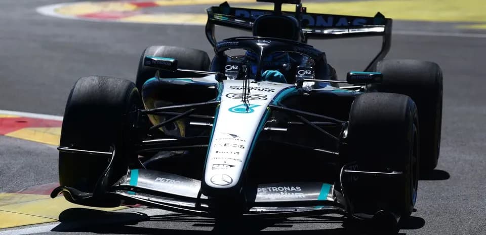 Mercedes F1 car racing on track during event