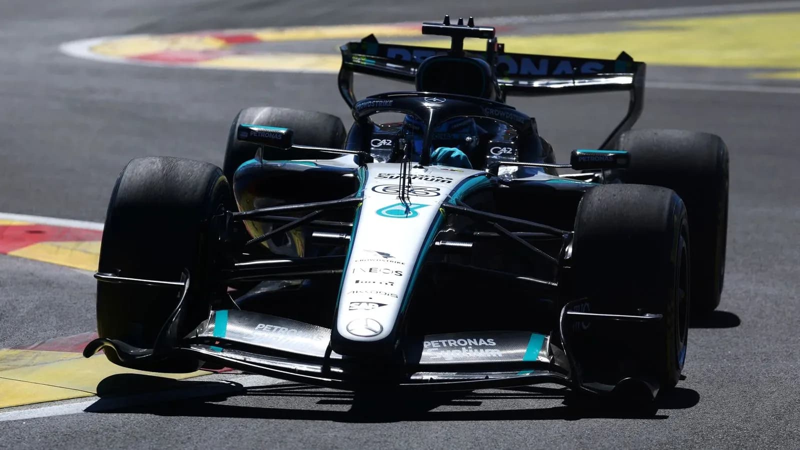 Mercedes F1 car racing on track during event