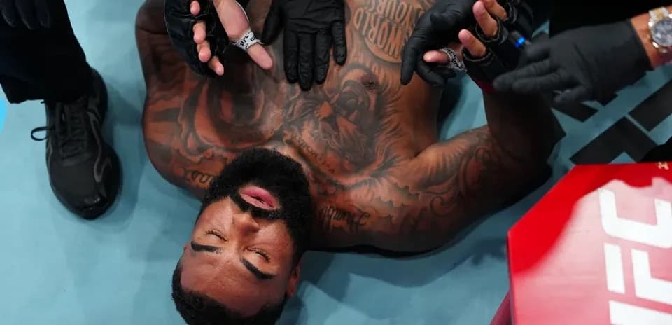 Fighter receiving medical attention in the ring