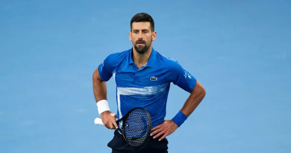 Tennis player in blue shirt during match