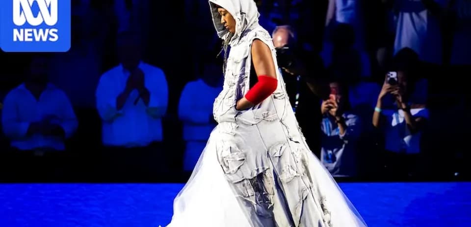 Person wearing a unique dress on stage