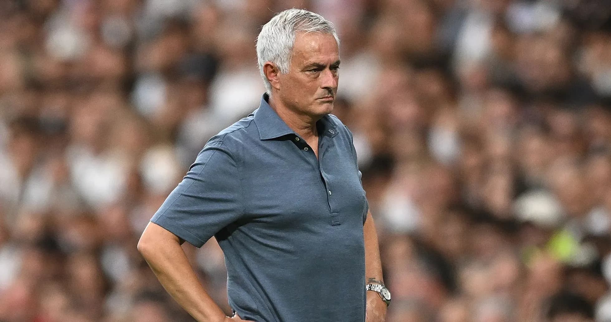 Manager observing the match from the sideline
