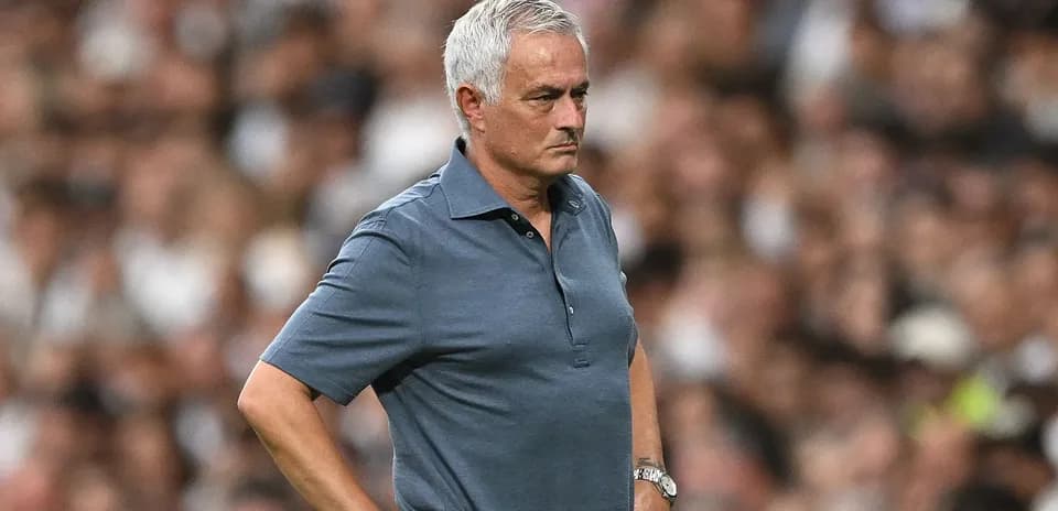 Manager observing the match from the sideline