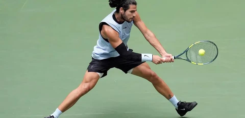 Player executing a forehand stroke during match