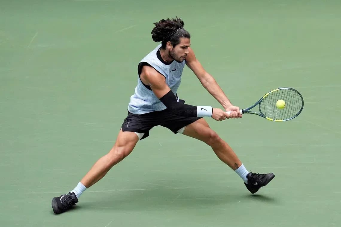 Player executing a forehand stroke during match