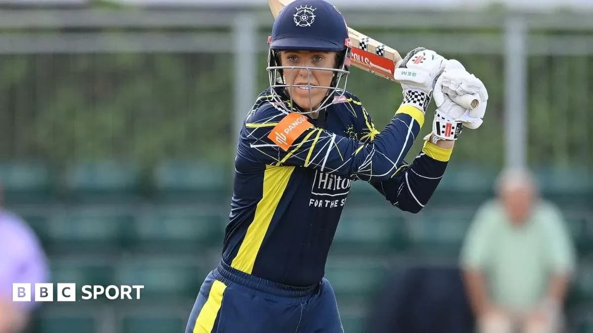 Batter preparing to hit the ball in cricket match