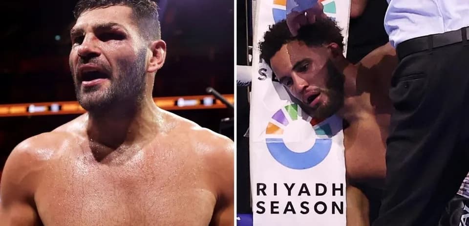 Two boxers after a match; one celebrating, one injured