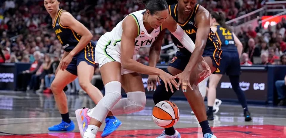 Players battling for possession of the basketball
