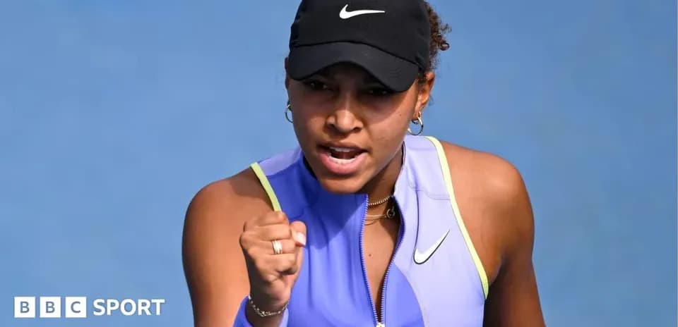 Tennis player celebrating a point during match