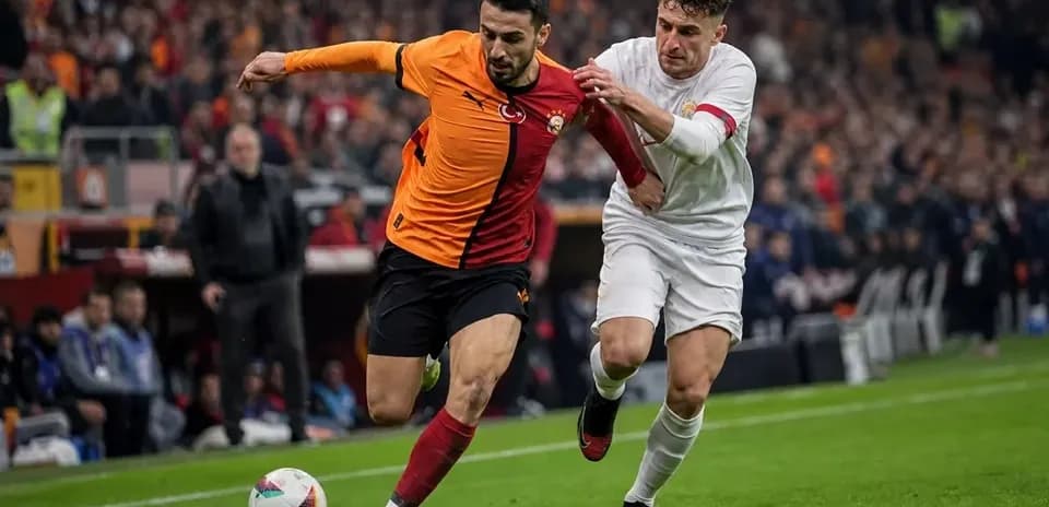 Player dribbling while being challenged by opponent