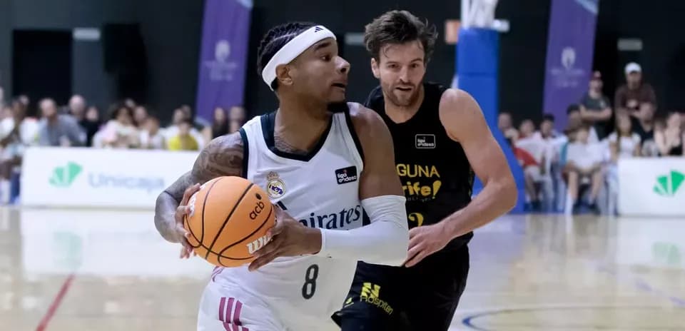 Player dribbling basketball during match action