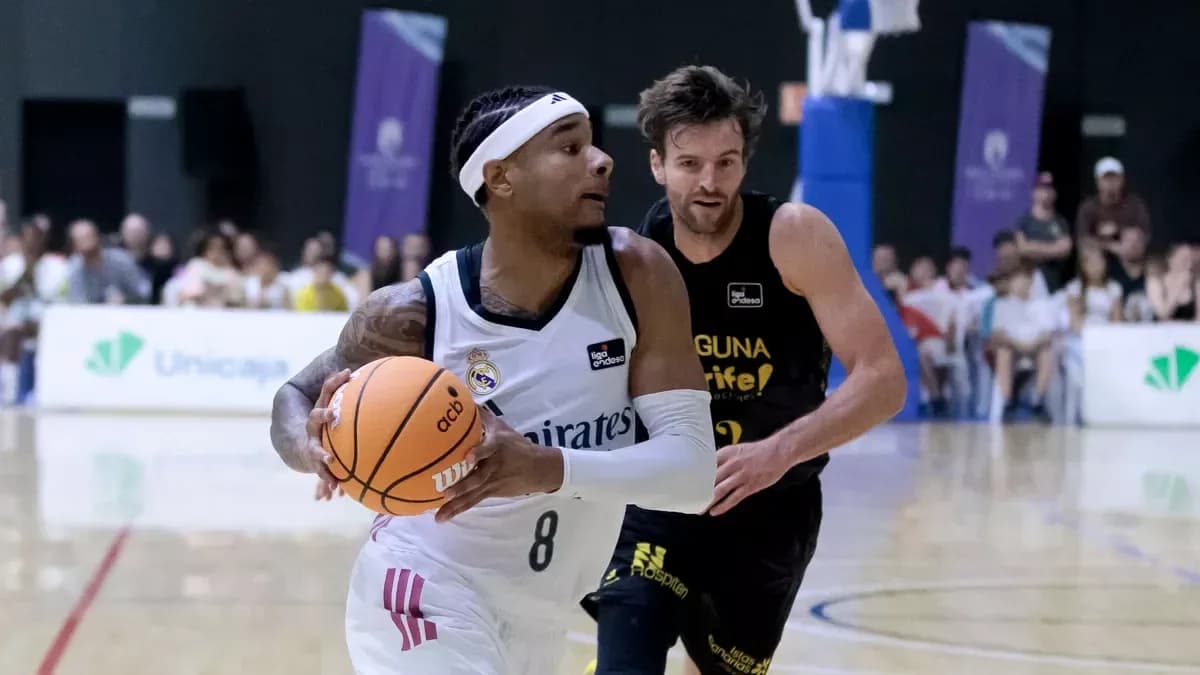 Player dribbling basketball during match action Player dribbling basketball during match action