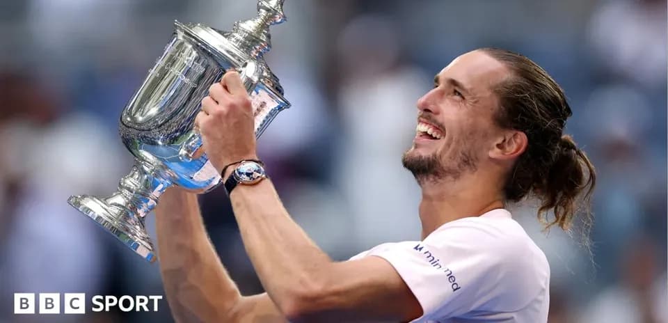 Player celebrating with trophy after match victory