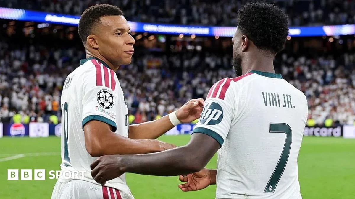 Mbappé and Viní Jr. celebrating on the pitch