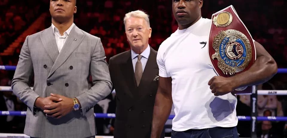 Two boxers and a promoter at boxing event