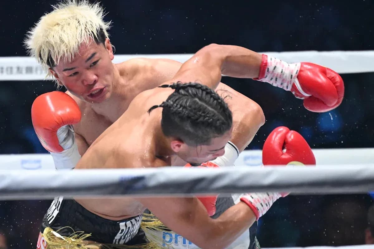 Boxers exchanging punches in the ring during match