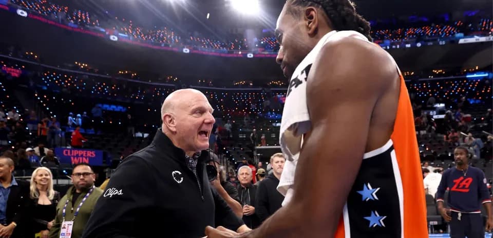 Steve Ballmer and Kawhi Leonard celebrating after game