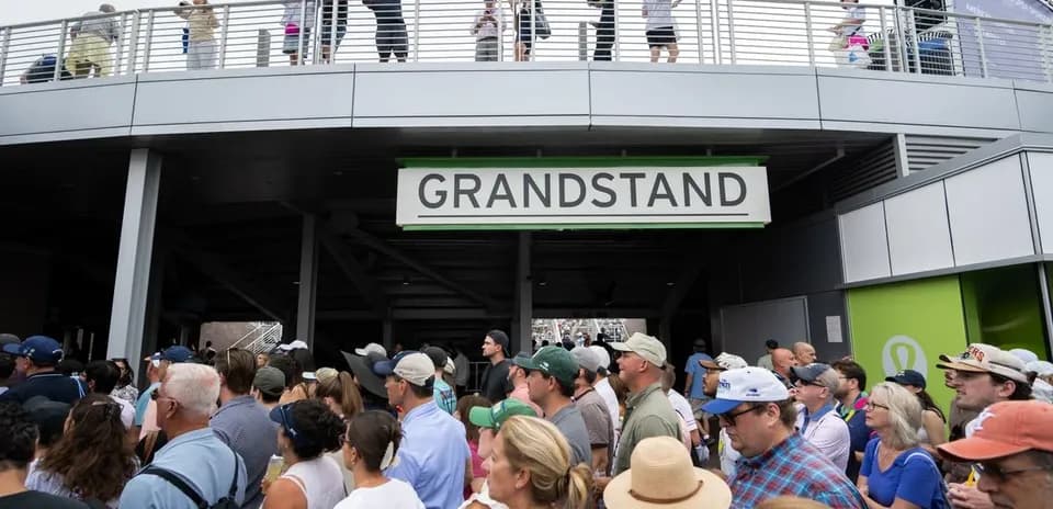 Crowd gathered at Grandstand entrance during event