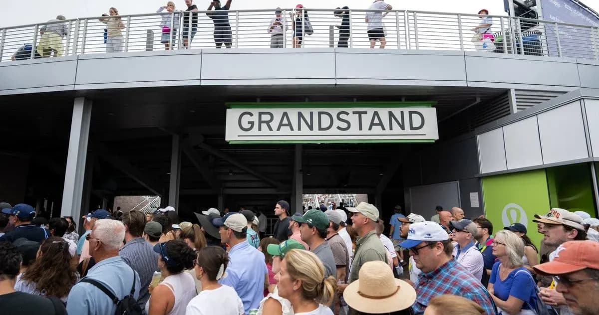 Crowd gathered at Grandstand entrance during event