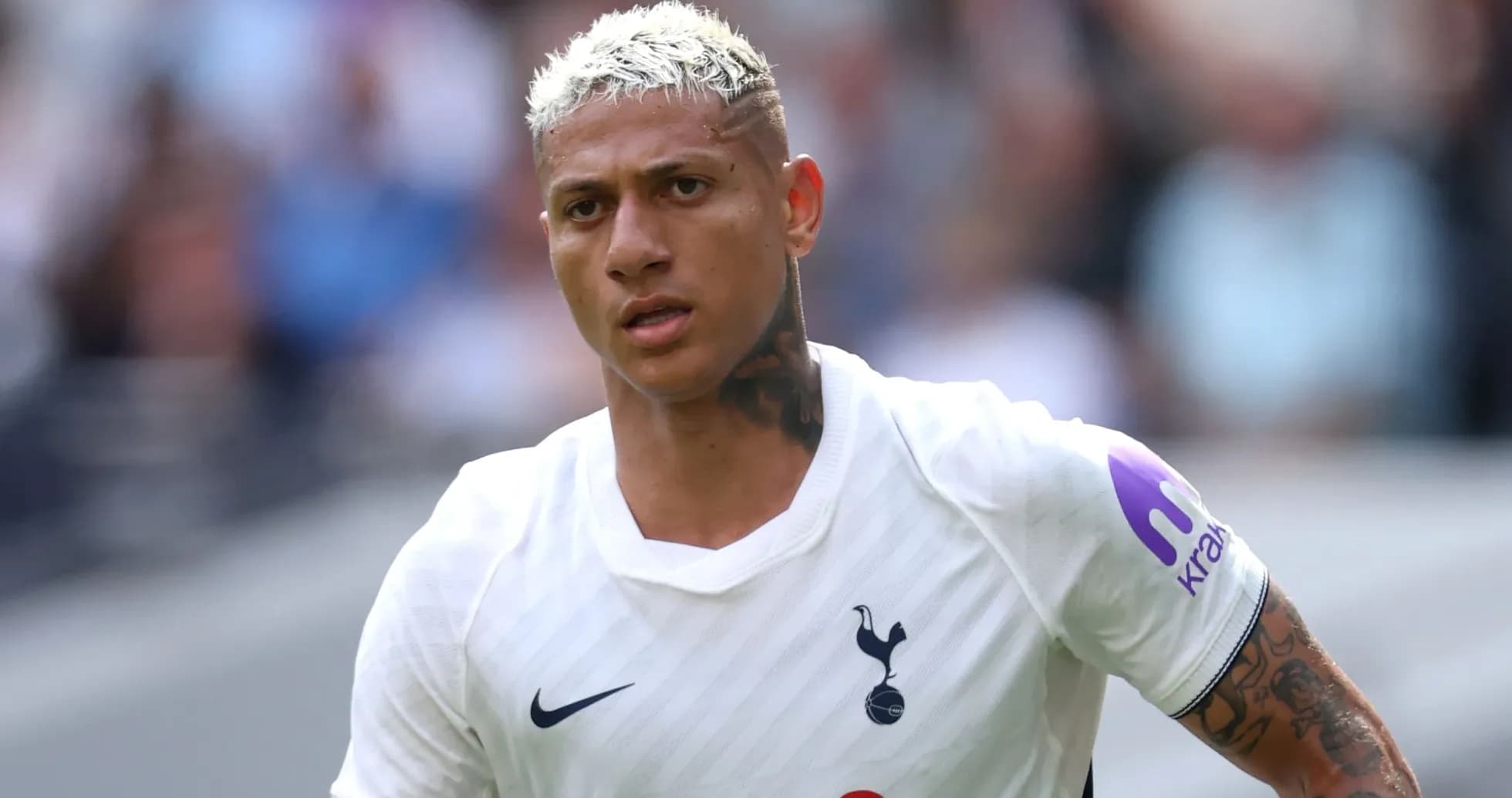 Player in Tottenham jersey during match action