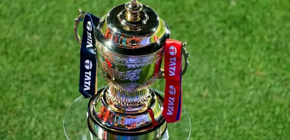 Trophy displayed on a glass stand on grass