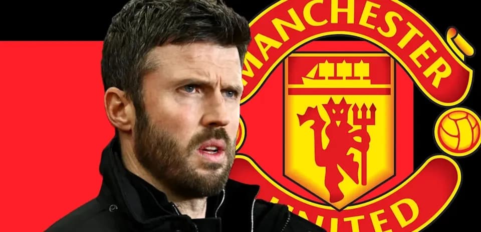 Man in front of Manchester United logo