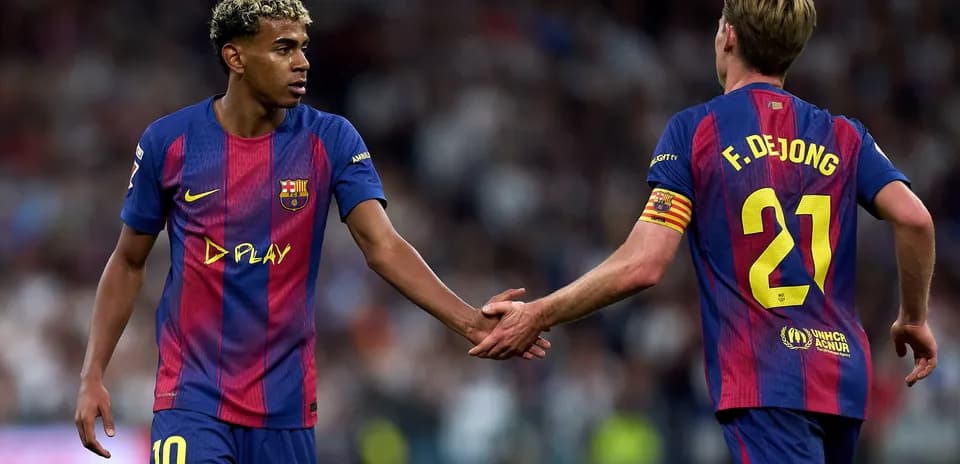 Barcelona players shaking hands during match