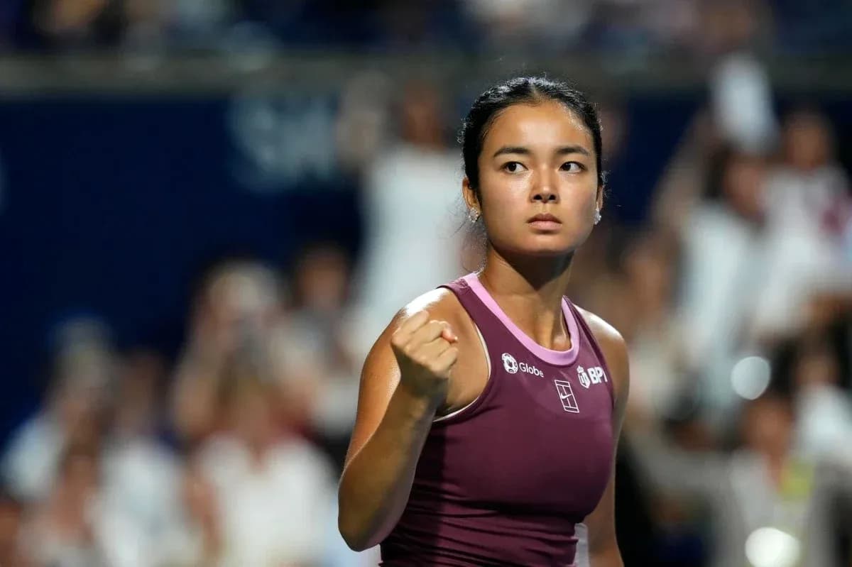 Tennis player celebrating a point during match
